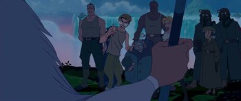 Movie still from “Atlantis: The Lost Empire” (2001), directed by Gary Trousdale – A group of men standing next to each other in front of a waterfall; Medium shot, Over the shoulder angle