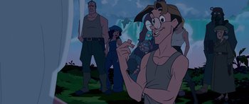 Movie still from “Atlantis: The Lost Empire” (2001), directed by Gary Trousdale – A group of people standing in the grass; Medium shot, Low angle