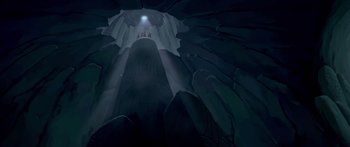 Movie still from “Atlantis: The Lost Empire” (2001), directed by Gary Trousdale – A group of people standing on top of a mountain; Extreme Wide shot, Overhead angle