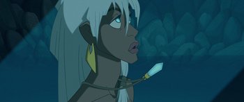Movie still from “Atlantis: The Lost Empire” (2001), directed by Gary Trousdale – A cartoon character with a light in his mouth; Close Up shot, Low angle