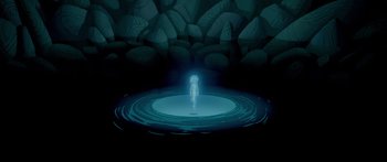 Movie still from “Atlantis: The Lost Empire” (2001), directed by Gary Trousdale – An image of a person standing in the middle of a pool of water; Extreme Wide shot, High angle