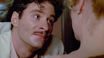 Movie still from “Sophie's Choice” (1982), directed by Alan J. Pakula – A person with a mustache; Close Up shot, Low angle