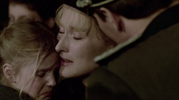 Movie still from “Sophie's Choice” (1982), directed by Alan J. Pakula – A person with their eyes closed; Close Up shot, Low angle