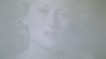 Movie still from “Sophie's Choice” (1982), directed by Alan J. Pakula – A woman's face in the fog; Close Up shot, Overhead angle