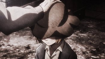 Movie still from “Attack on Titan” (2013), directed by Masashi Koizuka – A person with a hat in the middle of the night; Close Up shot, Low angle