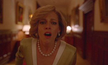 Movie still from “Spencer” (2021), directed by Pablo Larraín – A person wearing a dress and a pearl necklace; Close Up shot, Low angle