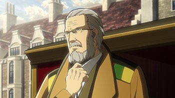 Movie still from “Attack on Titan” (2013), directed by Masashi Koizuka – An old man with a beard and glasses is standing in front of a building; Medium shot, Low angle