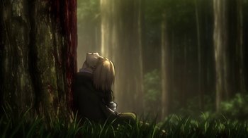 Movie still from “Attack on Titan” (2013), directed by Masashi Koizuka – A person sitting in the grass next to a tree; Wide shot, Low angle
