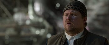 Movie still from “Spider-Man: Homecoming” (2017), directed by Jon Watts – A person wearing a hat; Close Up shot, Low angle