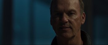 Movie still from “Spider-Man: Homecoming” (2017), directed by Jon Watts – An older man is looking into the camera; Close Up shot, Low angle