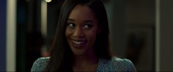 Movie still from “Spider-Man: Homecoming” (2017), directed by Jon Watts – A person with long black hair; Close Up shot, Over the shoulder angle