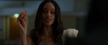 Movie still from “Spider-Man: Homecoming” (2017), directed by Jon Watts – A beautiful young woman with long black hair; Close Up shot, Over the shoulder angle