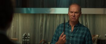 Movie still from “Spider-Man: Homecoming” (2017), directed by Jon Watts – A man holding a knife in front of his face; Close Up shot, Low angle