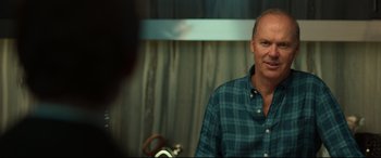 Movie still from “Spider-Man: Homecoming” (2017), directed by Jon Watts – A person wearing a plaid shirt; Close Up shot, Over the shoulder angle