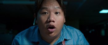 Movie still from “Spider-Man: Homecoming” (2017), directed by Jon Watts – A person wearing a blue shirt; Close Up shot, Low angle