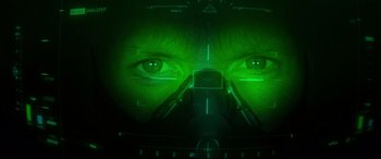 Movie still from “Spider-Man: Homecoming” (2017), directed by Jon Watts – A person's eyes in a night - vision device; Extreme Close Up shot, Low angle