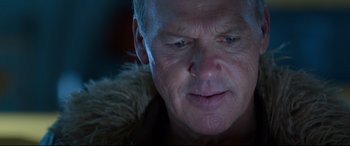 Movie still from “Spider-Man: Homecoming” (2017), directed by Jon Watts – An older man looking down at the ground; Close Up shot, Low angle