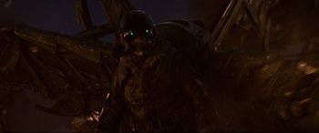 Movie still from “Spider-Man: Homecoming” (2017), directed by Jon Watts – A person wearing a helmet; Medium shot, Low angle