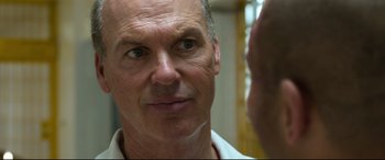 Movie still from “Spider-Man: Homecoming” (2017), directed by Jon Watts – A man's face looking into a mirror; Close Up shot, Over the shoulder angle