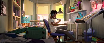 Movie still from “Spider-Man: Into the Spider-Verse” (2018), directed by Peter Ramsey – A man sitting in a chair with headphones on; Wide shot, Low angle