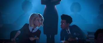 Movie still from “Spider-Man: Into the Spider-Verse” (2018), directed by Peter Ramsey – Two people are sitting in front of a woman in a suit; Medium shot, Over the shoulder angle