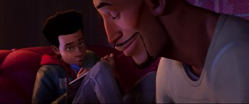 Movie still from “Spider-Man: Into the Spider-Verse” (2018), directed by Peter Ramsey – A man's face and a boy's face; Close Up shot, Over the shoulder angle