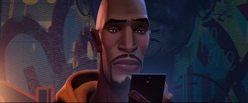 Movie still from “Spider-Man: Into the Spider-Verse” (2018), directed by Peter Ramsey – An animated man is taking a picture of himself with a cell phone; Extreme Close Up shot, Over the shoulder angle