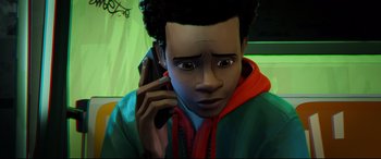 Movie still from “Spider-Man: Into the Spider-Verse” (2018), directed by Peter Ramsey – A man is talking on a cell phone; Close Up shot, High angle