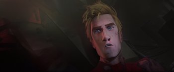 Movie still from “Spider-Man: Into the Spider-Verse” (2018), directed by Peter Ramsey – A man with blonde spiky hair stares into the distance; Close Up shot, Overhead angle