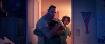 Movie still from “Spider-Man: Into the Spider-Verse” (2018), directed by Peter Ramsey – A man holding a baseball mitt while standing next to a woman; Medium shot, Over the shoulder angle