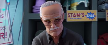 Movie still from “Spider-Man: Into the Spider-Verse” (2018), directed by Peter Ramsey – An animated picture of a man with a mustache and glasses; Close Up shot, Over the shoulder angle