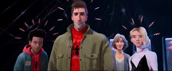 Movie still from “Spider-Man: Into the Spider-Verse” (2018), directed by Peter Ramsey – A man and a woman standing next to each other in front of lights; Medium shot, Over the shoulder angle
