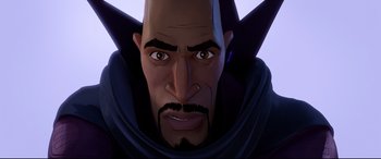 Movie still from “Spider-Man: Into the Spider-Verse” (2018), directed by Peter Ramsey – An animated face of a man with a beard and mustache; Close Up shot, Low angle
