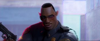 Movie still from “Spider-Man: Into the Spider-Verse” (2018), directed by Peter Ramsey – A person wearing a police uniform and sunglasses; Close Up shot, Low angle