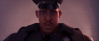 Movie still from “Spider-Man: Into the Spider-Verse” (2018), directed by Peter Ramsey – An animated police officer wearing glasses and a hat; Close Up shot, High angle