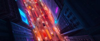 Movie still from “Spider-Man: Into the Spider-Verse” (2018), directed by Peter Ramsey – An aerial view of a city street at night; Extreme Wide shot, Overhead angle