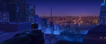 Movie still from “Spider-Man: Into the Spider-Verse” (2018), directed by Peter Ramsey – An image of a city at night with lights; Extreme Wide shot, Low angle