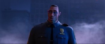 Movie still from “Spider-Man: Into the Spider-Verse” (2018), directed by Peter Ramsey – A man in a police officer's uniform with glasses; Close Up shot, Over the shoulder angle