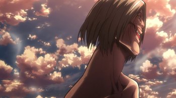 Movie still from “Attack on Titan” (2013), directed by Masashi Koizuka – A woman's face in front of a cloudy sky; Close Up shot, Low angle
