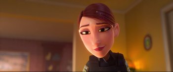 Movie still from “Spies in Disguise” (2019), directed by Troy Quane – A cartoon of a police officer with green eyes and red hair; Close Up shot, Over the shoulder angle