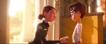 Movie still from “Spies in Disguise” (2019), directed by Troy Quane – A female police officer talking to a female police officer; Medium shot, Over the shoulder angle