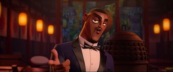 Movie still from “Spies in Disguise” (2019), directed by Troy Quane – A man in a suit and bow tie; Close Up shot, Over the shoulder angle