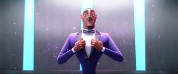 Movie still from “Spies in Disguise” (2019), directed by Troy Quane – A man in a purple suit and a bow tie; Medium shot, Low angle