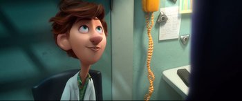 Movie still from “Spies in Disguise” (2019), directed by Troy Quane – A cartoon of a person with a white shirt and a yellow cord; Close Up shot, Over the shoulder angle