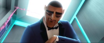 Movie still from “Spies in Disguise” (2019), directed by Troy Quane – A man in a tuxedo looking at his cell phone; Close Up shot, Low angle
