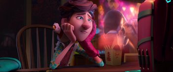 Movie still from “Spies in Disguise” (2019), directed by Troy Quane – A person sitting on the ground with a box of french fries in front of them; Medium shot, Over the shoulder angle