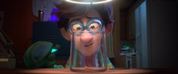 Movie still from “Spies in Disguise” (2019), directed by Troy Quane – A man with glasses is looking into a glass; Close Up shot, Over the shoulder angle