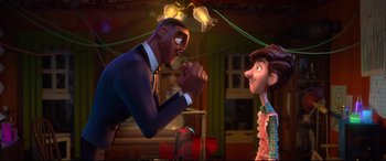 Movie still from “Spies in Disguise” (2019), directed by Troy Quane – Two animated characters are fighting in a room with lights; Medium shot, Over the shoulder angle