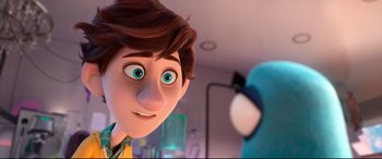 Movie still from “Spies in Disguise” (2019), directed by Troy Quane – A person's face in a room; Close Up shot, Over the shoulder angle
