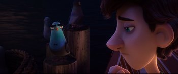 Movie still from “Spies in Disguise” (2019), directed by Troy Quane – A bird on a pole near a person; Close Up shot, Over the shoulder angle